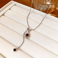 Detail of silver sun flower pendant with brown tiger eye stone on white jewelry box - 40# Necklace-Silver-Coffee