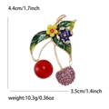 Elegant rhinestone cherry brooch in gold metal with dimensions 4.4cm x 3.5cm and 10.3g weight - Gold Red