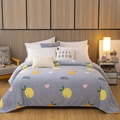 Couverture en flanelle grise avec motifs citrons et oranges pour un lit douillet - Fête de l'Orange