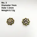 Macro shot of 7mm antique bronze flower bead caps with 1.5mm hole for DIY jewelry making - 3#