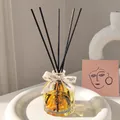 Bergamot & Citrus reed diffuser set in faceted glass bottle with elegant black sticks - 100ml / Bergamot & Citrus