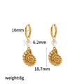 Detail view of gold seashell earrings with 6.2mm pearl and 18.7mm conch pendant - Conch Pearl Style(TE60482)