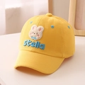 Close-up of yellow children's cap with cute bunny patch and blue Stella embroidery - 52cm (Recommended 3-8 Years) / Yellow