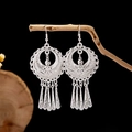 Ethnic style hollow silver tassel earrings featuring floral center and metal fringes - Circular Hollow Small Flower Dangle Tassel Style (E2871-11)
