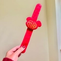 Red plush snap bracelet with a golden Fu character embroidery and mouse head shape - Mickey