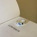 Lava texture silver ring with dual emerald cut blue stones in an adjustable open band design - Adjustable Open / Textured Double Blue Square Stone Style (J3368)