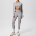 Detailed view of light gray three-piece women activewear set with jacket and leggings - Frost Grey