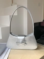 Chic silver bow baguette bag in metallic PU leather for a trendy underarm style - Silver