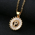 Gold letter P pendant necklace with sparkling baguette-cut cubic zirconia sunburst frame - Gold Letter P