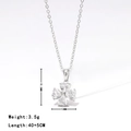 Silver clover necklace with clear cubic zirconia heart-shaped stones and sizing details - Platinum