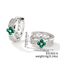 Macro view showing dimensions of silver clover hoop earrings with green zircon inlays - Silver/Green Flower