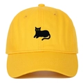 Close-up of a yellow cotton baseball cap featuring a black cat embroidery and curved brim - Adjustable / Yellow