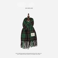 Green and dark brown plaid scarf with fringe tassels and a sewn rectangular label - YF Plaid (Green)