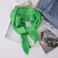 Vibrant green pleated silk scarf knotted on a tray, stylish neckerchief for women - 70*70cm / Pleated Green