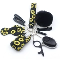Black sunflower safety keychain set with personal alarm, wristlet, and pompom accessories - Black Sunflower (Style 14)
