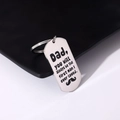 Close-up of polished stainless steel dog tag keychain with Dad engraved message and gift ring - Style 5 (Dad First Man I Loved)