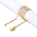 Close-up of golden water wave chain with lobster clasp on white display prop - 42cm / Gold Water Wave Chain
