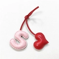 Detail of handmade leather S-letter and red heart bag charm with fine stitching texture - Light Pink with Bright Red Heart