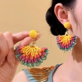 Detailed view of colorful raffia fan-shaped drop earrings for vacation style. - Fan Shape Style / 1 Pair Pack / Colorful