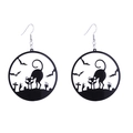 Detailed close-up of acrylic Halloween earrings featuring black cat and bat silhouettes - Cat and Bat Round