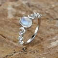 Retro oval moonstone ring with crescent moon accents and silver finish on rock - US 5 / White Gold