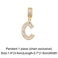 Macro shot of gold-plated cubic zirconia letter C pendant with dimension markings - Letter C Pendant