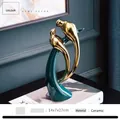 Modern abstract dark green ceramic love bird sculpture with gold finish 14x27cm - Love Birds Gaze 9122