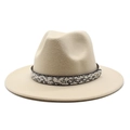 Close-up of beige felt fedora featuring snakeskin patterned band and small gold buckle detail - Beige
