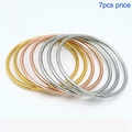 Set of 7 minimalist stackable stainless steel bangles in gold, rose gold and silver - 3 Steel + 2 Gold + 2 Rose Gold