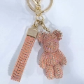 Pink rhinestone bear keychain with matching sparkling strap and golden metal ring - Peach Red