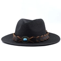 Detail of black straw fedora featuring a brown leather band and turquoise stone accessory - Black