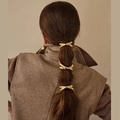 Minimalist bright gold X-shaped metal chain hair tie for ponytails in modern style - Cross Gold Clip