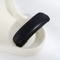 Solid black PU leather hair clip with wrinkled texture and elegant curved design - Leather Black