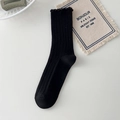 Women's black cotton crew socks with ribbed texture and ruffled wood ear edge - One Size / Black
