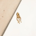 Macro detail of a gold octopus pendant with pink gem eyes and crystal tentacles - 1# Octopus Pink Zircon
