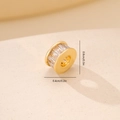 Macro shot of 8mm gold spacer bead with rectangular zircons for DIY jewelry making - Gold Rectangle Cut Zirconia Ring