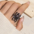 Close-up of a gothic black spider ring featuring encrusted crystals on a metal base - Adjustable Open / Black Spider Style (6038BK)