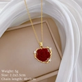 Detailed view of red velvet rose heart necklace with rhinestones on beige jewelry box - Gold Heart Red Rose Style (D112)