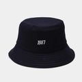 Close-up of 1987 white embroidery on a navy blue cotton bucket hat with stitched brim - M(56-58cm) / Navy Blue