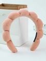 Pink sponge cloud headband with plush towel texture and soft braided puffy design - Light Orange