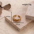 Adjustable golden stainless steel ring with leaf-like oval texture in a light luxury style - Wave Bumpy Texture