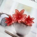 Translucent pink floral hair claw clip made of resin with a French plumeria design - Red