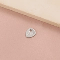 Macro shot of silver stainless steel teardrop pendant with S.Steel engraving detail - Teardrop S.Steel Tag (9#) / Steel