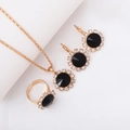 Elegant gold bridal jewelry set featuring black faceted stones and sparkling rhinestones - Three-Piece Set / Round-Black