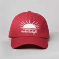 Detailed view of red cotton baseball cap featuring Harbor Sunlight white embroidery - Adjustable / Red