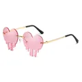 Pink heart-shaped melting sunglasses with gold metal frame and unique fluid design - Pink
