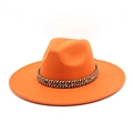 Close-up of bright orange wide brim wool fedora with geometric ethnic woven band - M (56-58cm) / Orange