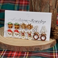 Set of six Christmas stud earrings featuring Santa, reindeer, and festive holiday trees - Style D (6 Pairs Set - White Christmas Tree/Pearl/Snowflake)