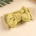 Mustard yellow knitted baby headband with large bow and textured jacquard pattern - Light Yellow