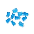 Vista macro di dieci ciondoli a forma di orsetto in resina blu con ganci per DIY - Blu Scuro Traslucido